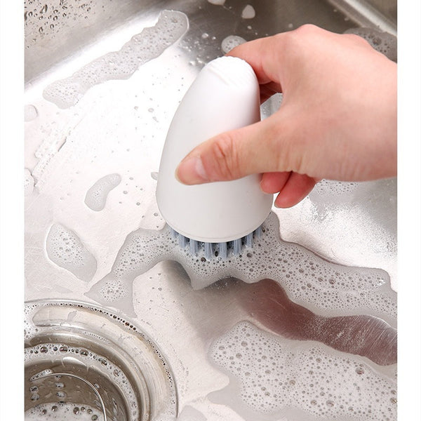 Carrot vegetable brush for kitchen prep in white
